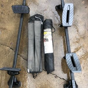 Roof rack with kayak holders